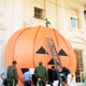 White House workers prepare to hang a giant inflated jack-o-lantern at the White House in Washington, Oct. 25, 1993. Halloween is Oct. 31. Photo via AP Images.